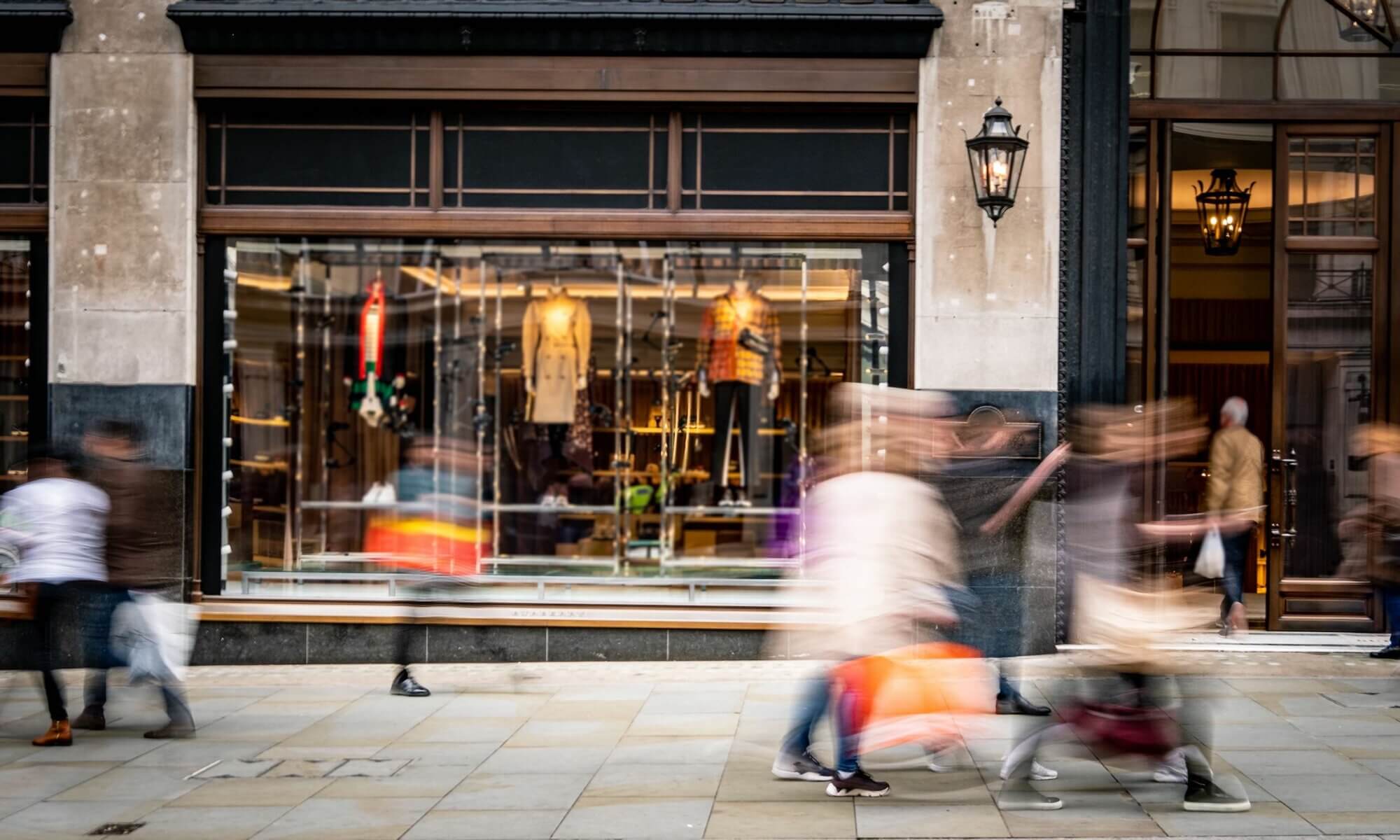 Motion blurred people on busy shopping street - can sustainable loyalty programs change consumers' minds blog